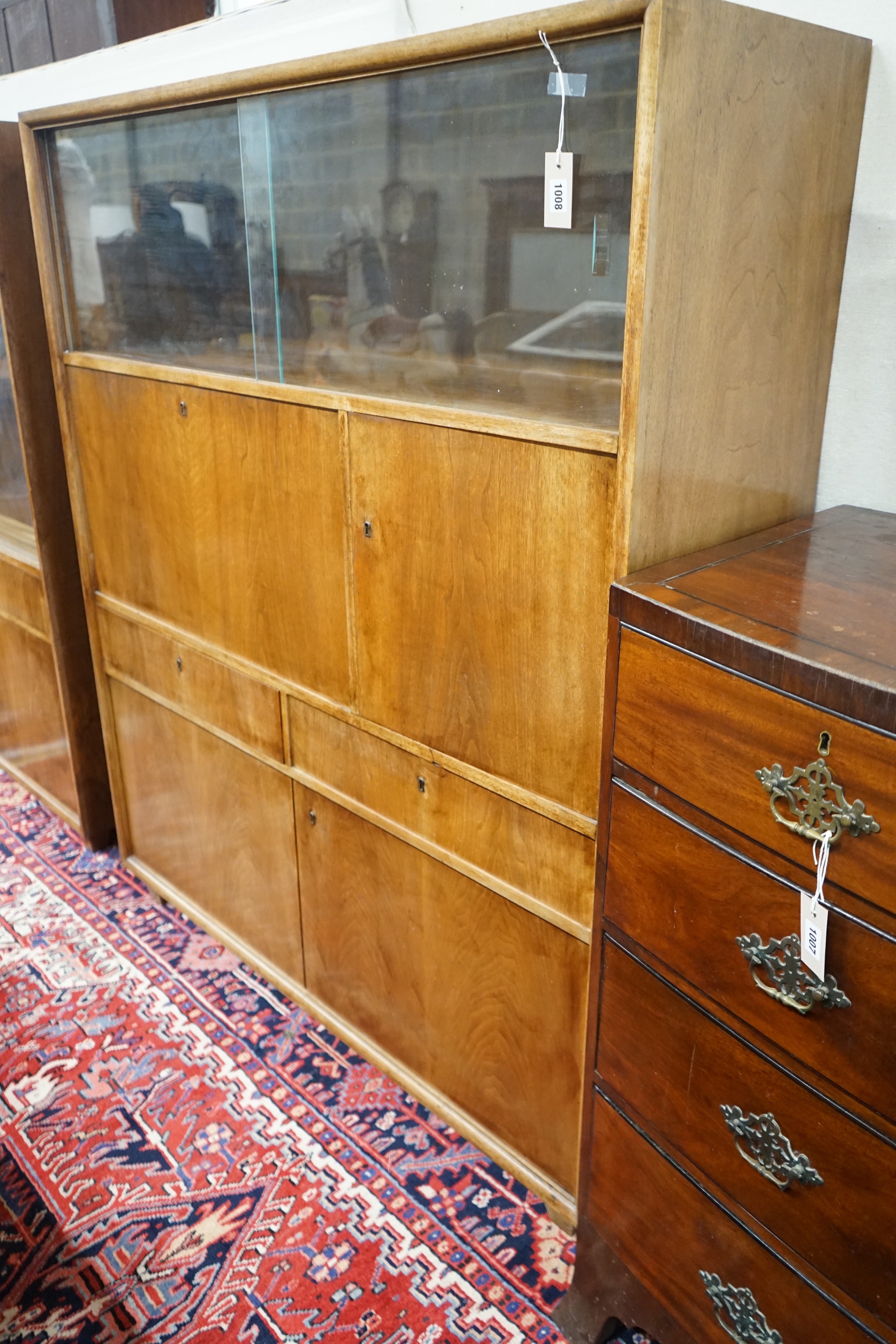 A mid century walnut writing cabinet by Georg Schoettle, Stuttgart, width 135cm, depth 40cm, height 160cm